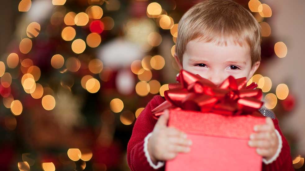 Christmas to do list boy holding present